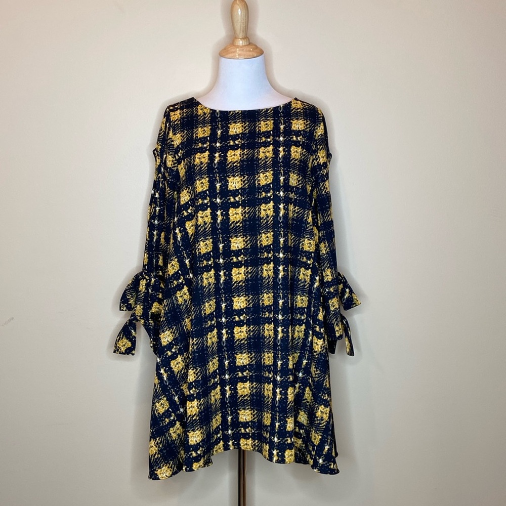 A line mini dress, bows on sleeves at wrists, size estimated (no size listed).